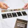 Priorities Fourth Wing Edition Game | Officially Licensed Party Game Inspired by Empyrean Series | Ages 17+ | 3+ Players | 20 Mins.